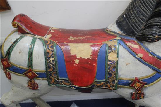 A carved and painted carousel horse, attributed to the Philadelphia Toboggan Company, 3ft 8in.